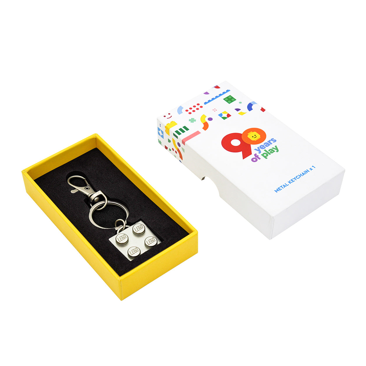 Брелок LEGO "90-летие: Ограниченная серия серебряного кирпича" - Boxette Shop